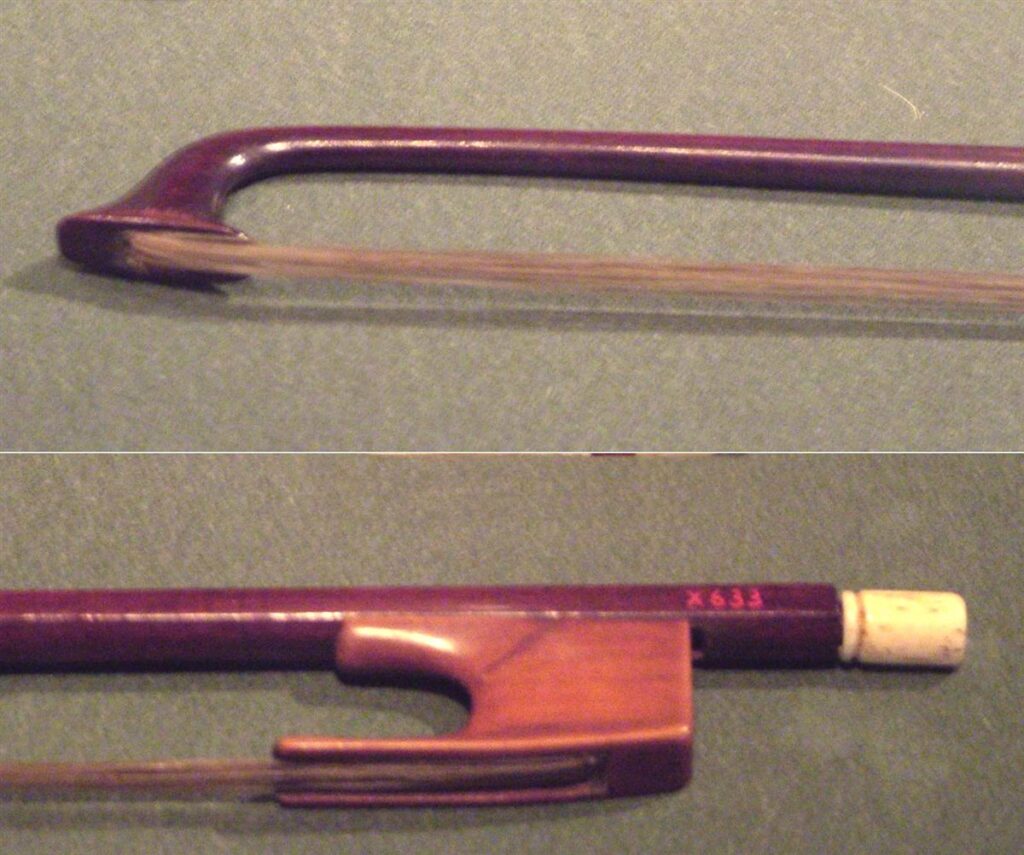 Punta y nuez de un arco de viol&iacute;n antiguo, con las cerdas tensadas entre ambas
